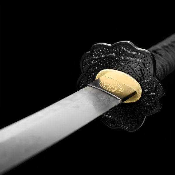 Akanokiba katana blade detail showing dense Damascus folded pattern with organic cloud and wave formations across entire steel surface