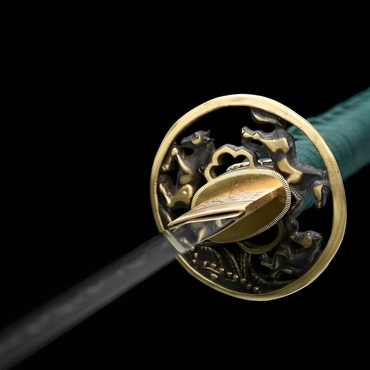 Openwork dragon guard in warm metallic tones on the Emerald katana