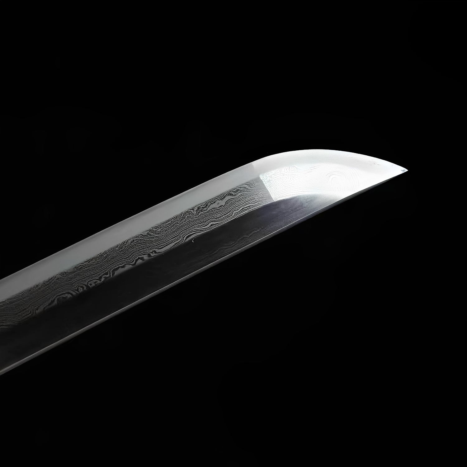 Kamakura katana blade detail showing layered Damascus folded grain running across entire polished surface