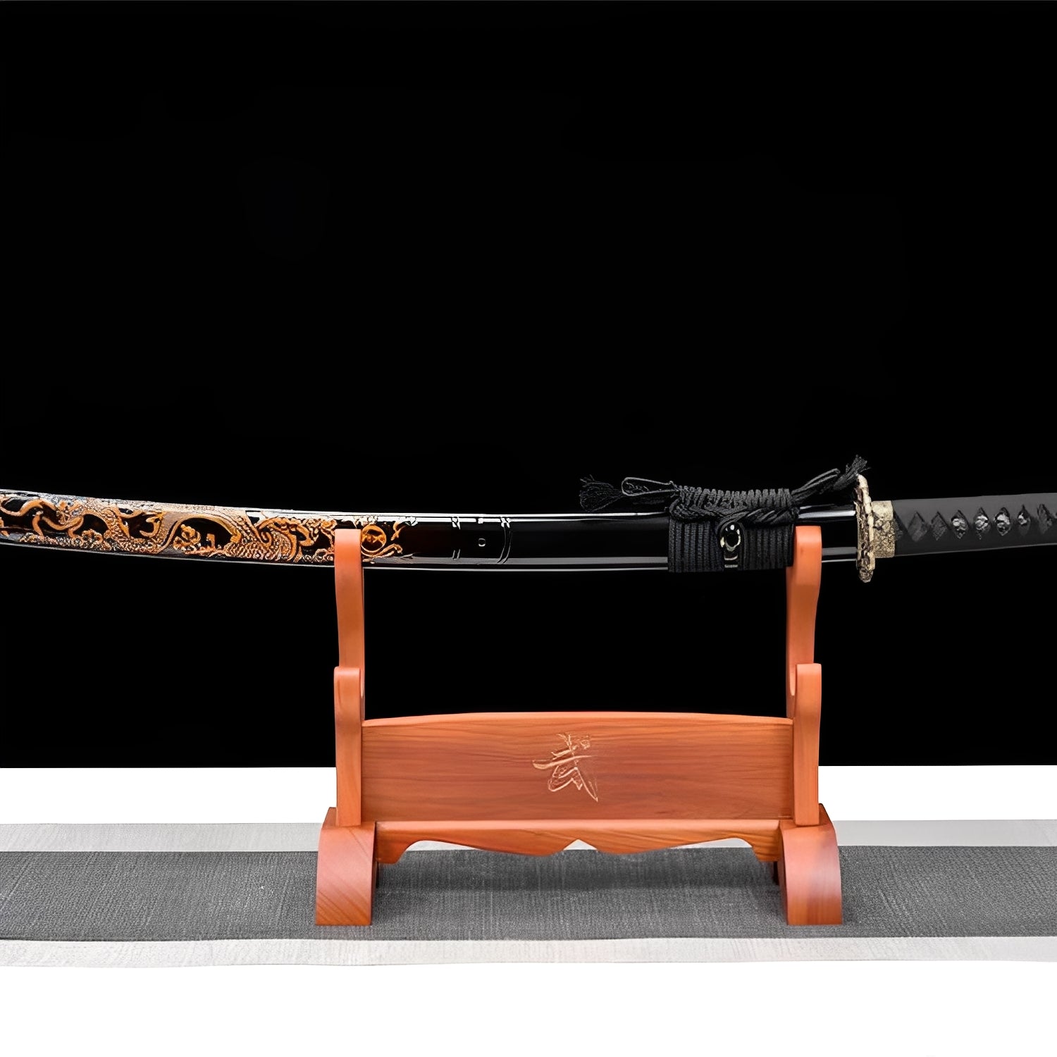 Kiso Hida katana saya detail showing natural brown wood grain flowing along the primary scabbard surface