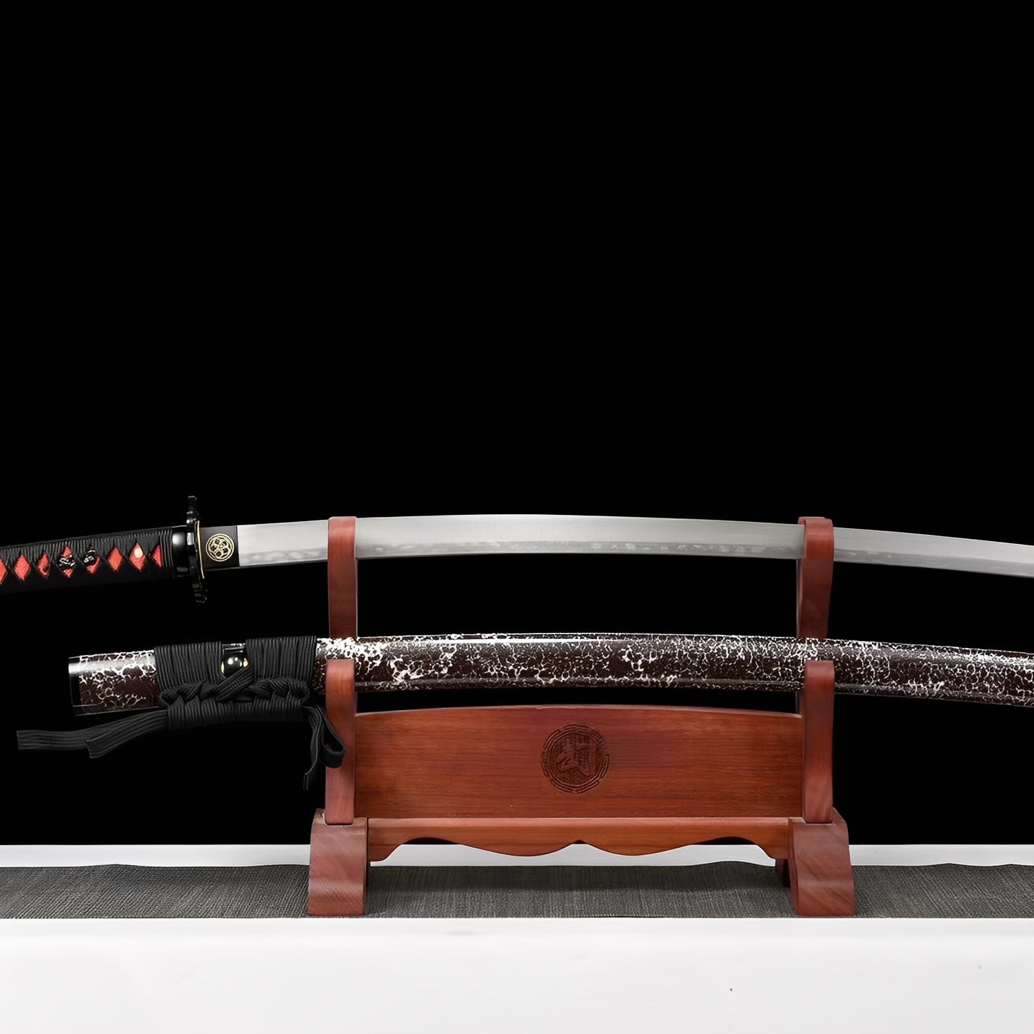 Red fang katana complete set with brown crackle saya, black-and-red handle, gold mon habaki, and wooden display stand
