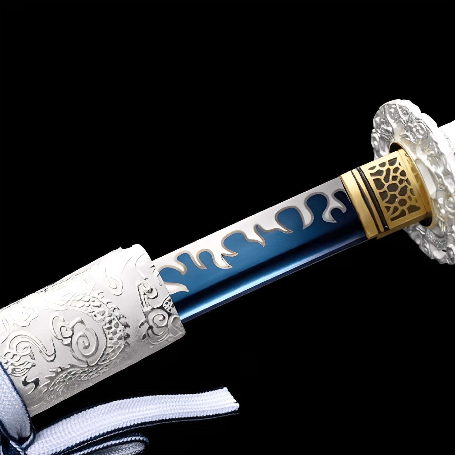 Seiryu Enbu Katana close-up showing blue manganese blade with white flame overlay pattern and hamon line, chrome iron dragon tsuba, brass honeycomb habaki, and white cotton ito with gold-plated menuki