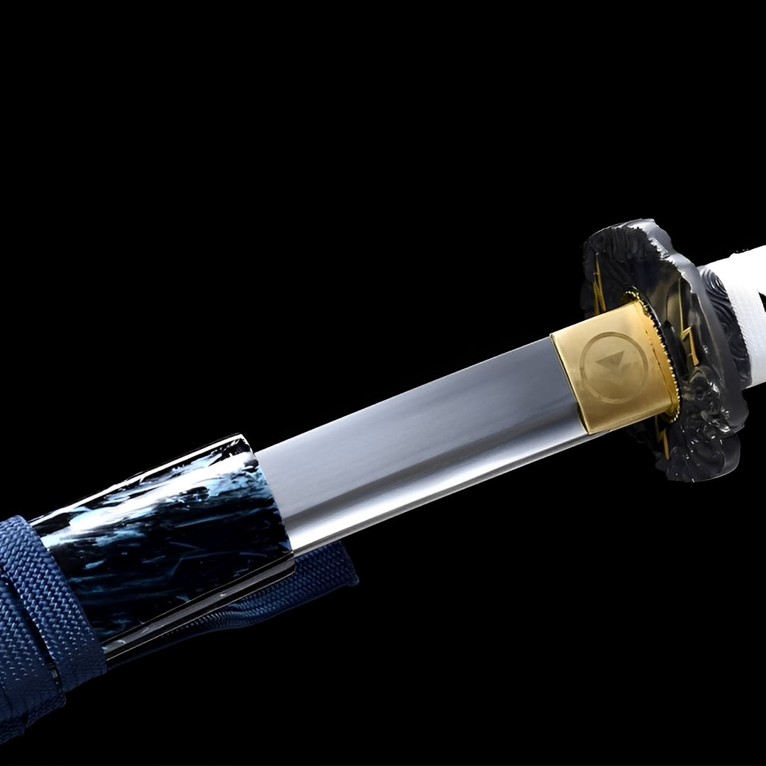 Polished blade and decorated collar of the Ghost of Tsushima katana