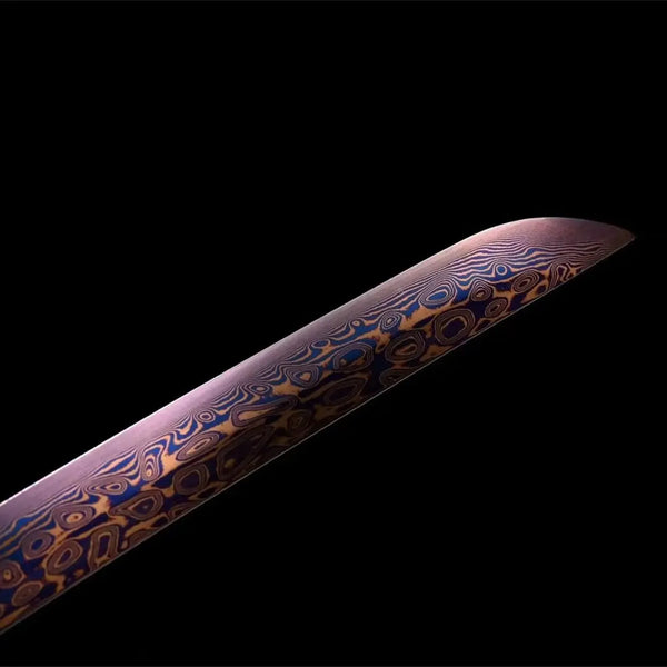 Purple Damascus artisan katana complete set with multi-texture saya, ornate bronze guard, black-gold sageo, and traditional display stand