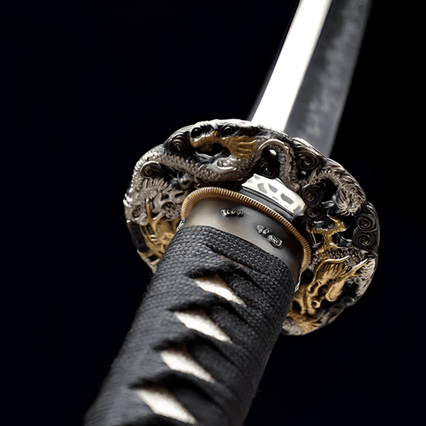 Ouryu Katana close-up showing T10 blade with visible hamon, copper tsuba with intertwined silver-gold twin dragons and cloud motifs, brass-copper habaki, and black ito over genuine white rayskin