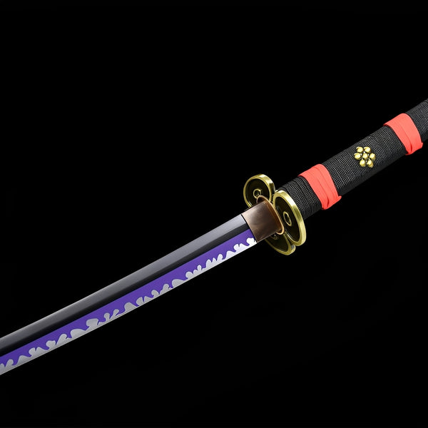 Black Enma Katana close-up showing polished blade with purple flame engravings and white wave pattern, brass tomoe tsuba, bronze habaki, and black-red cotton ito