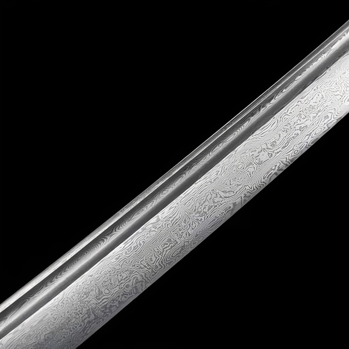 Visible Damascus grain and bo-hi groove on Kurenai Kage