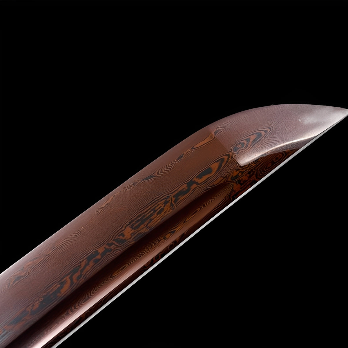 Copper-colored grain near the tip of the Kiso Hida blade