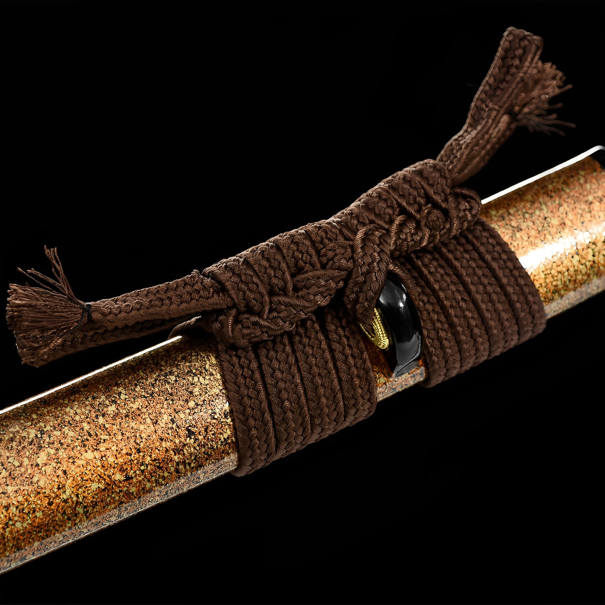 Brown sageo tied around the speckled copper-colored Kogarashi saya
