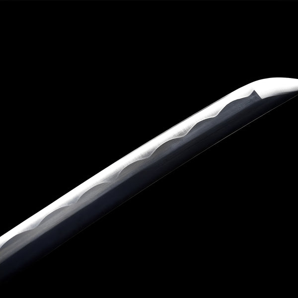 Yubashiri katana blade detail showing midare hamon pattern on polished 1060 carbon steel