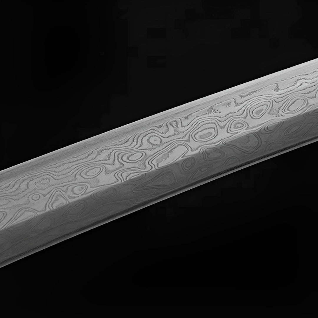 Rounded rosette grain across the Yugure Damascus blade