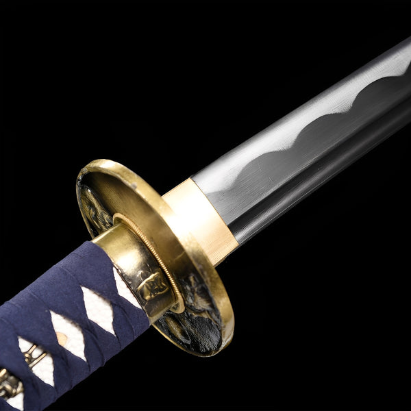 Arashi no Kiri katana blade detail showing transition from mirror-polished silver into darker storm zone with white bamboo stalks