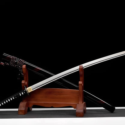 Crimson shadow katana complete set with black claw-marked saya, black handle, brass fittings, and wooden display stand