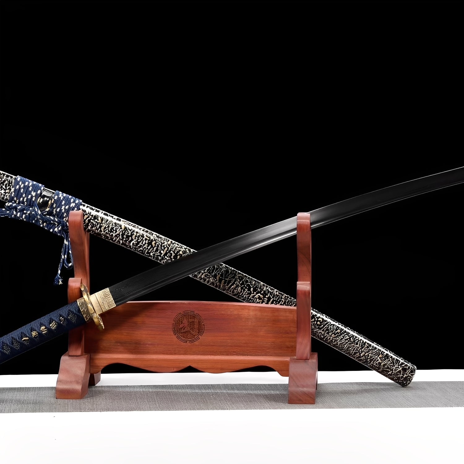 Frost lightning katana complete set with black dragon-engraved saya, white crackle saya, navy handle, and wooden display stand