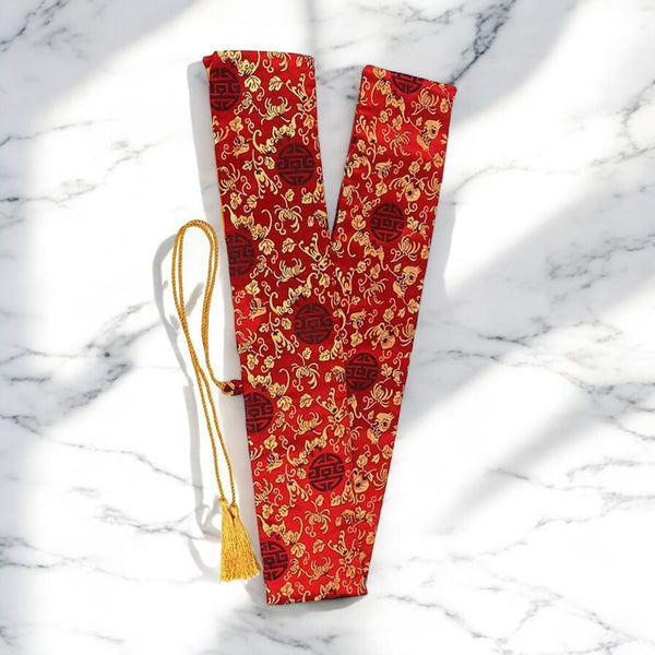 Katana Silk Bag in red silk with gold chrysanthemum-scrollwork brocade pattern and gold drawstring