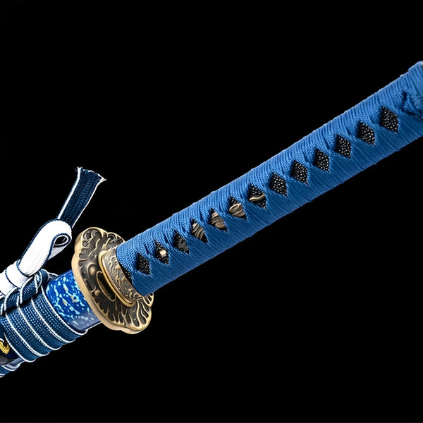 Kessho Sora katana saya detail showing white frost-crystal splatter pattern scattered across brilliant blue lacquer surface