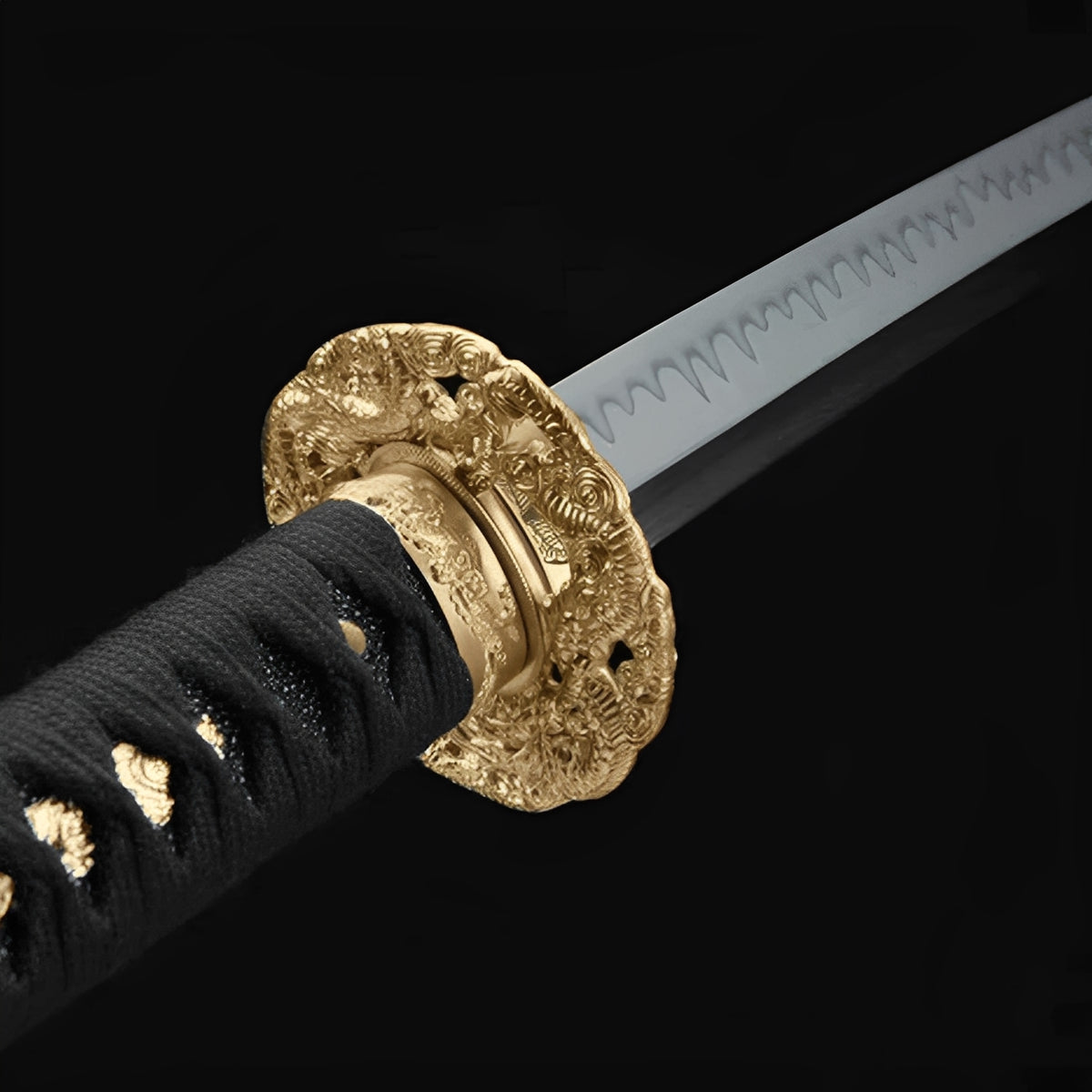 Golden dragon guard and black cotton handle on Koryo Ogon