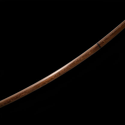 Mokuro Kageuchi katana saya detail showing natural rosewood grain flowing along the scabbard length with iron koiguchi fitting