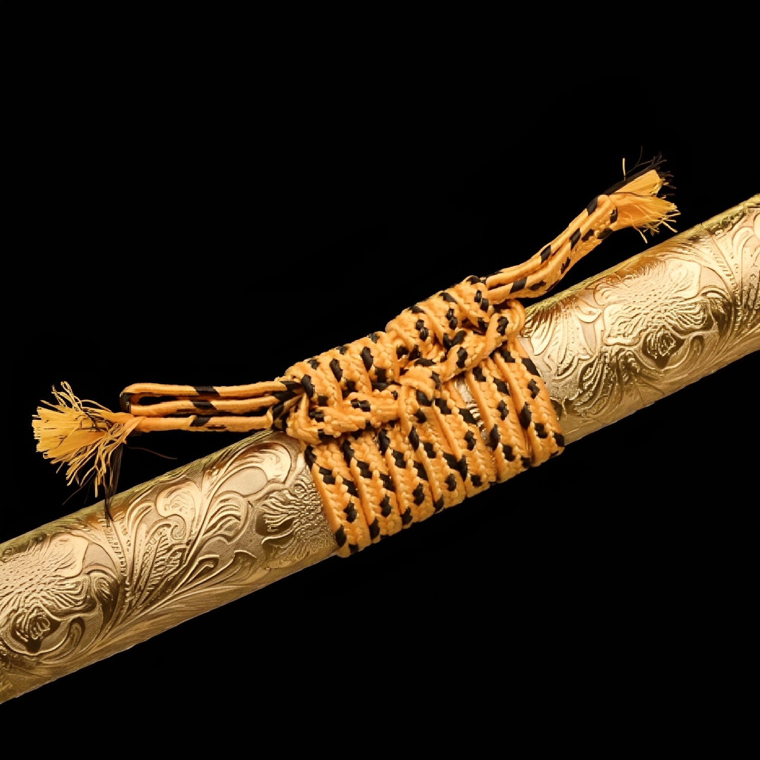 Ogon Ryushi katana saya detail showing sculpted dragon and cloud relief carved directly into gold lacquered wood surface
