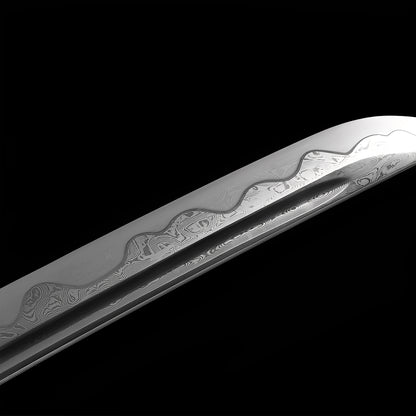 Ronin Wood katana blade detail showing cloud-wave engravings and clay-tempered hamon on polished Damascus steel