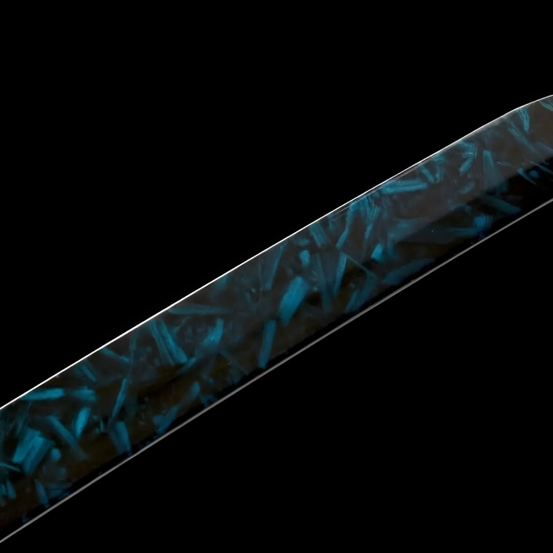 Blue Blade katana steel surface with a teal geometric pattern