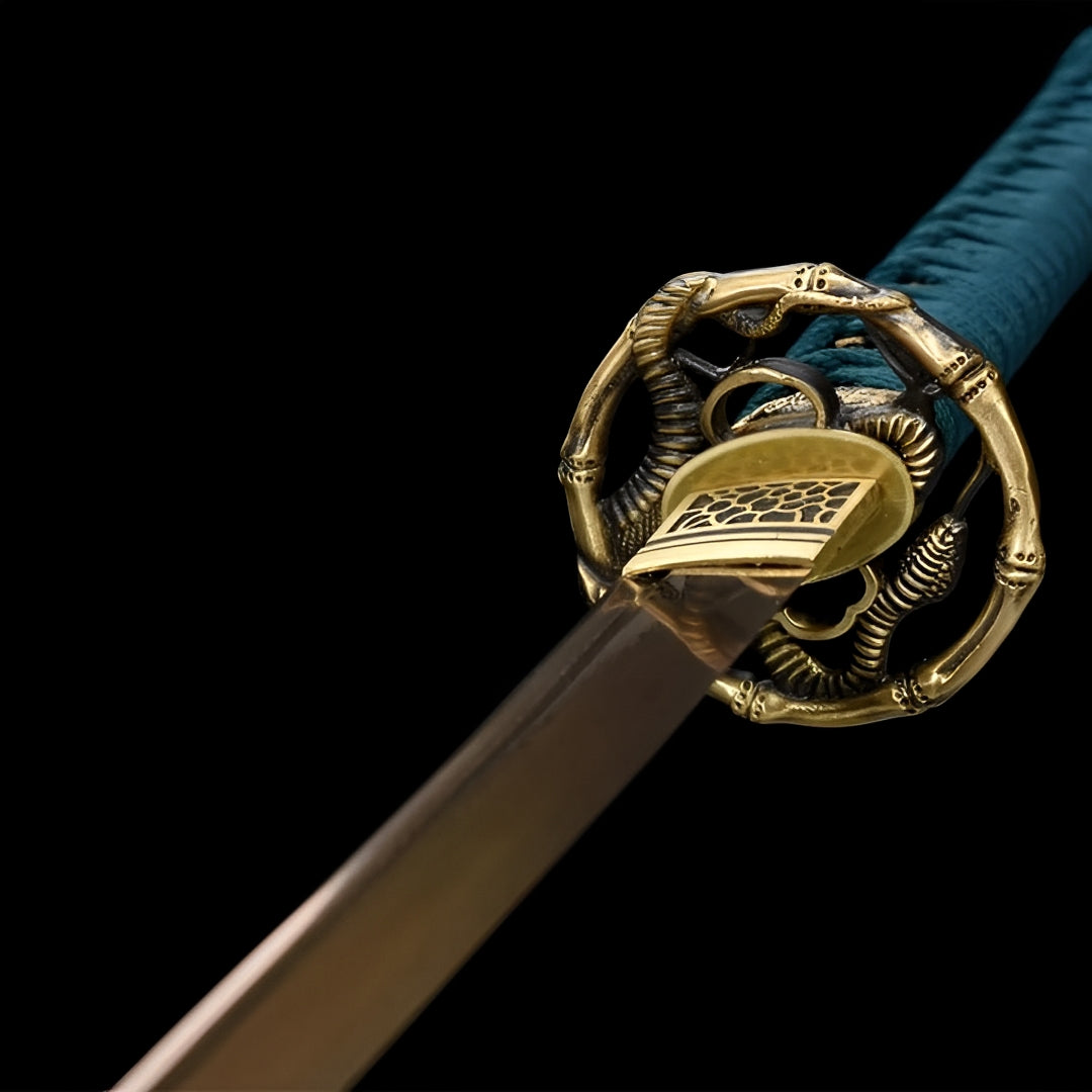 Serpent guard and golden blade finish on the Harugasumi katana