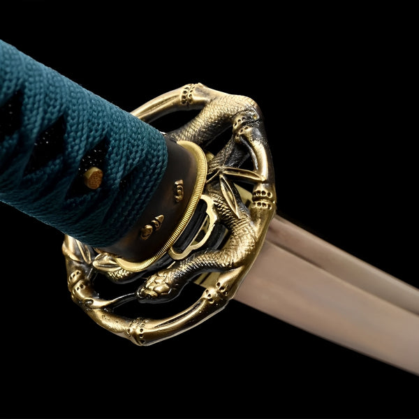 Harugasumi katana saya detail showing silver-gray crackle frost pattern and teal-black sageo