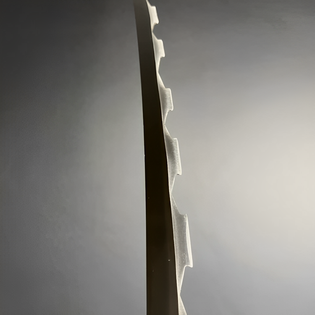 Close-up of the rectangular notches along an Inosuke sword blade