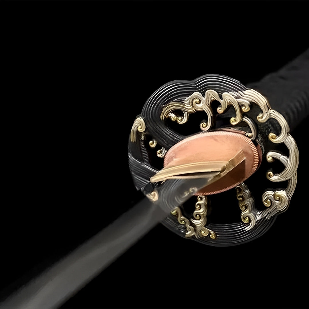 Silver-and-gold-toned openwork guard on the Kagekuro katana