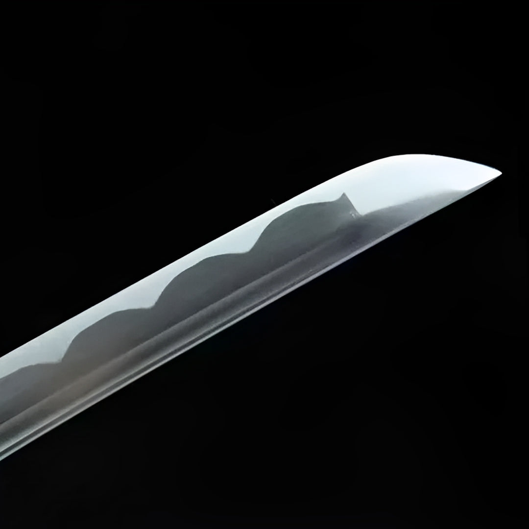 Rounded gunome-style line near the tip of the Kokuga blade