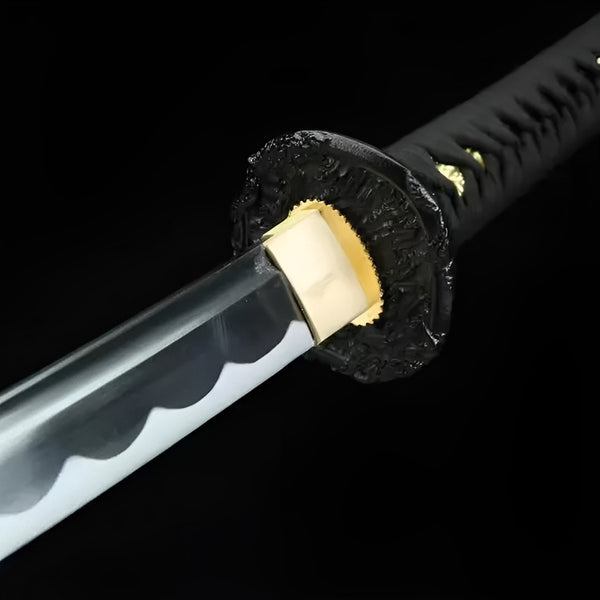 Kokuga katana blade detail showing gunome hamon temper line with rounded lobes on polished steel