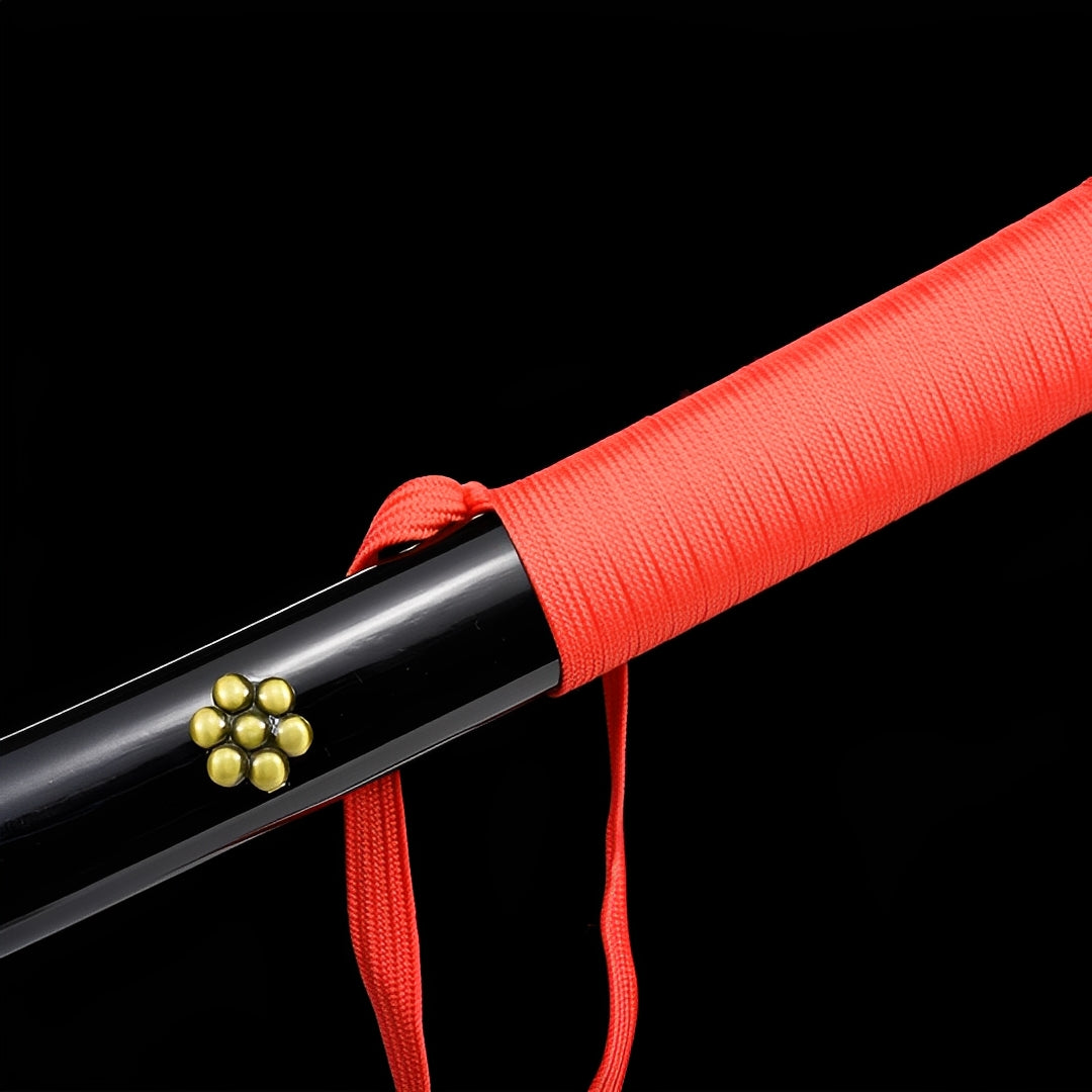 Black Enma scabbard with coral-red cord and gold-colored flowers