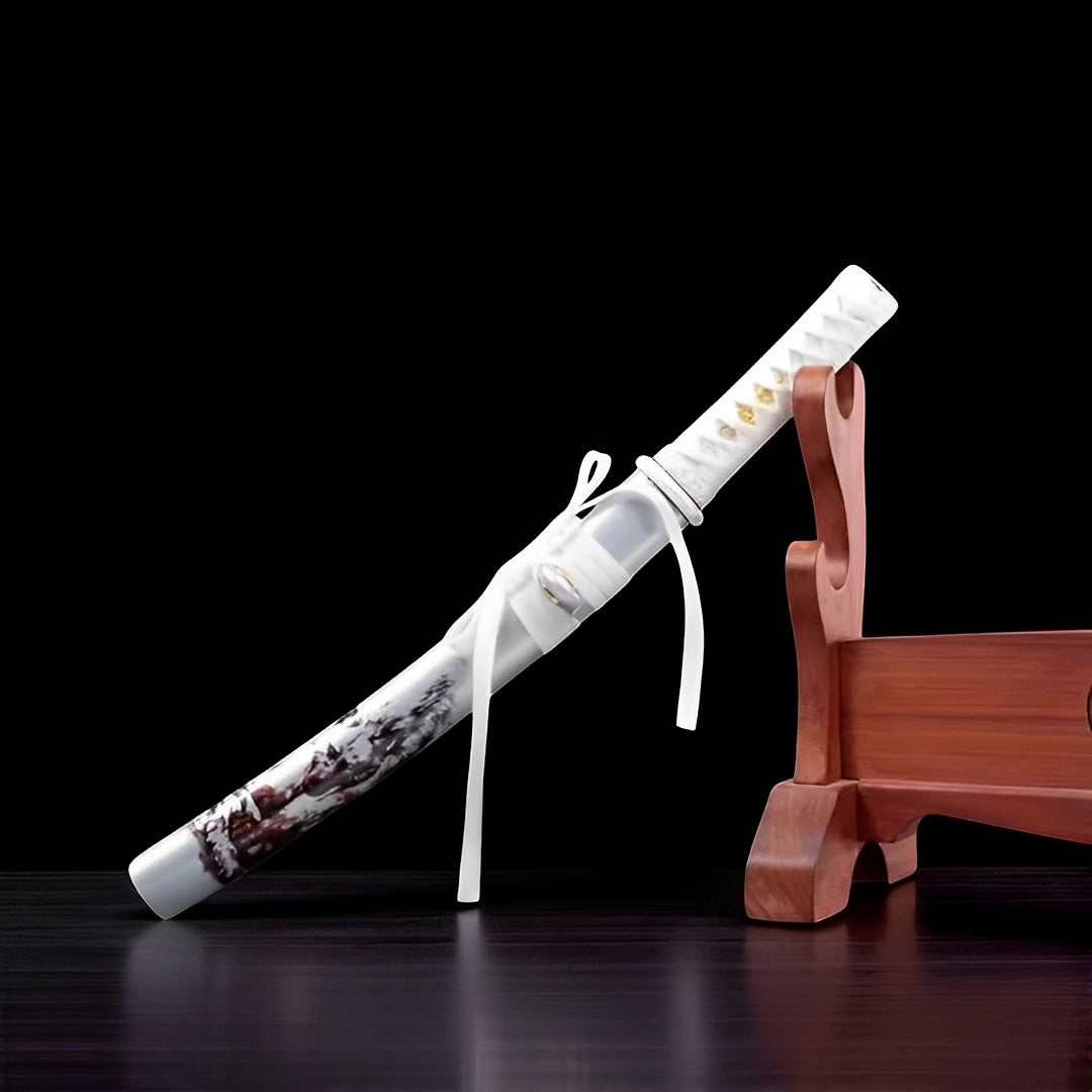 The Shirayuki tanto reflects winter's purity through its white lacquered elegance
