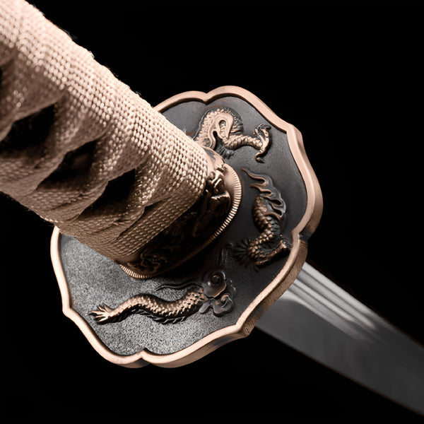 Royal Shinto katana tsuba detail showing golden imperial chrysanthemum (kiku mon) on bronze copper guard