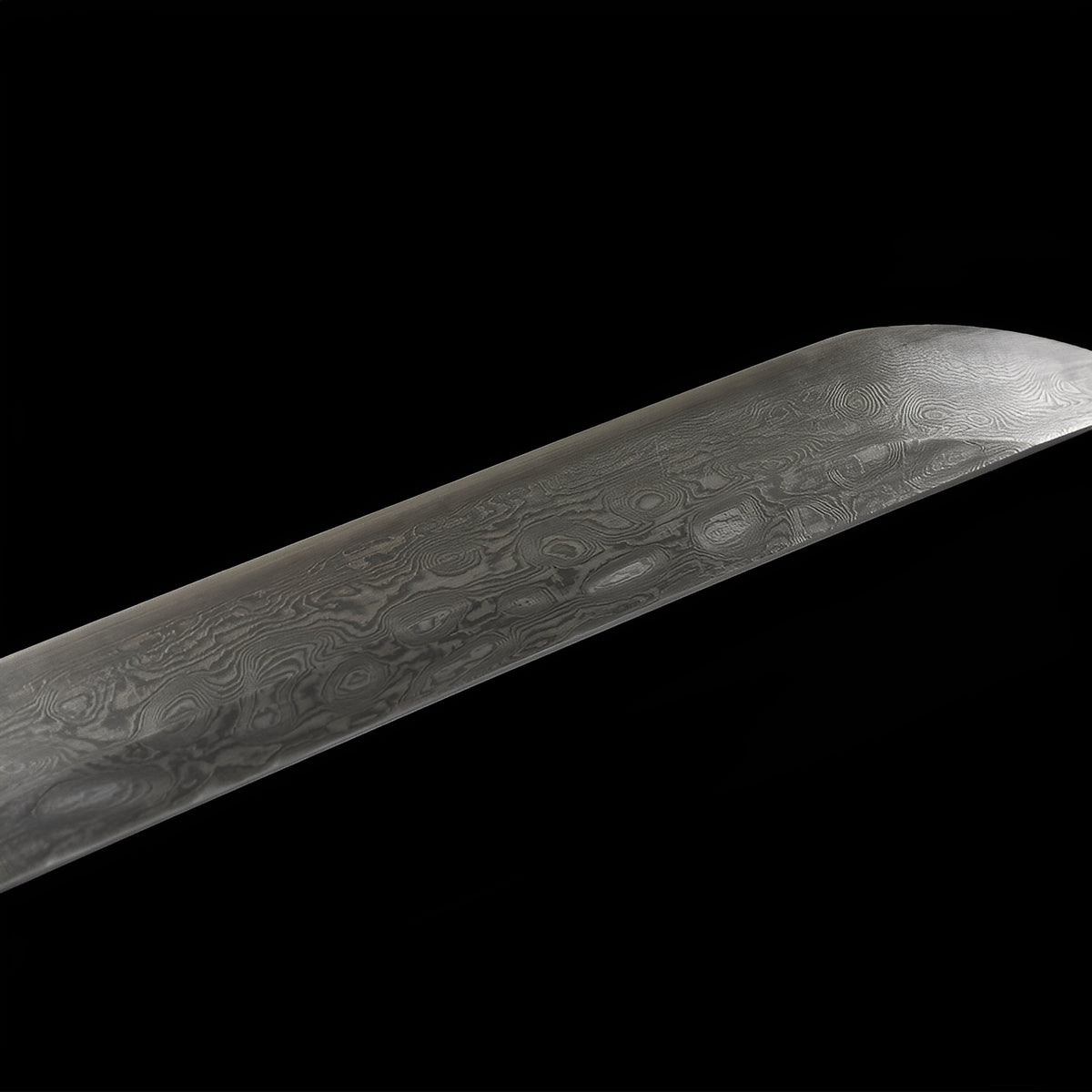 Close-up of the polished Aurora Damascus blade