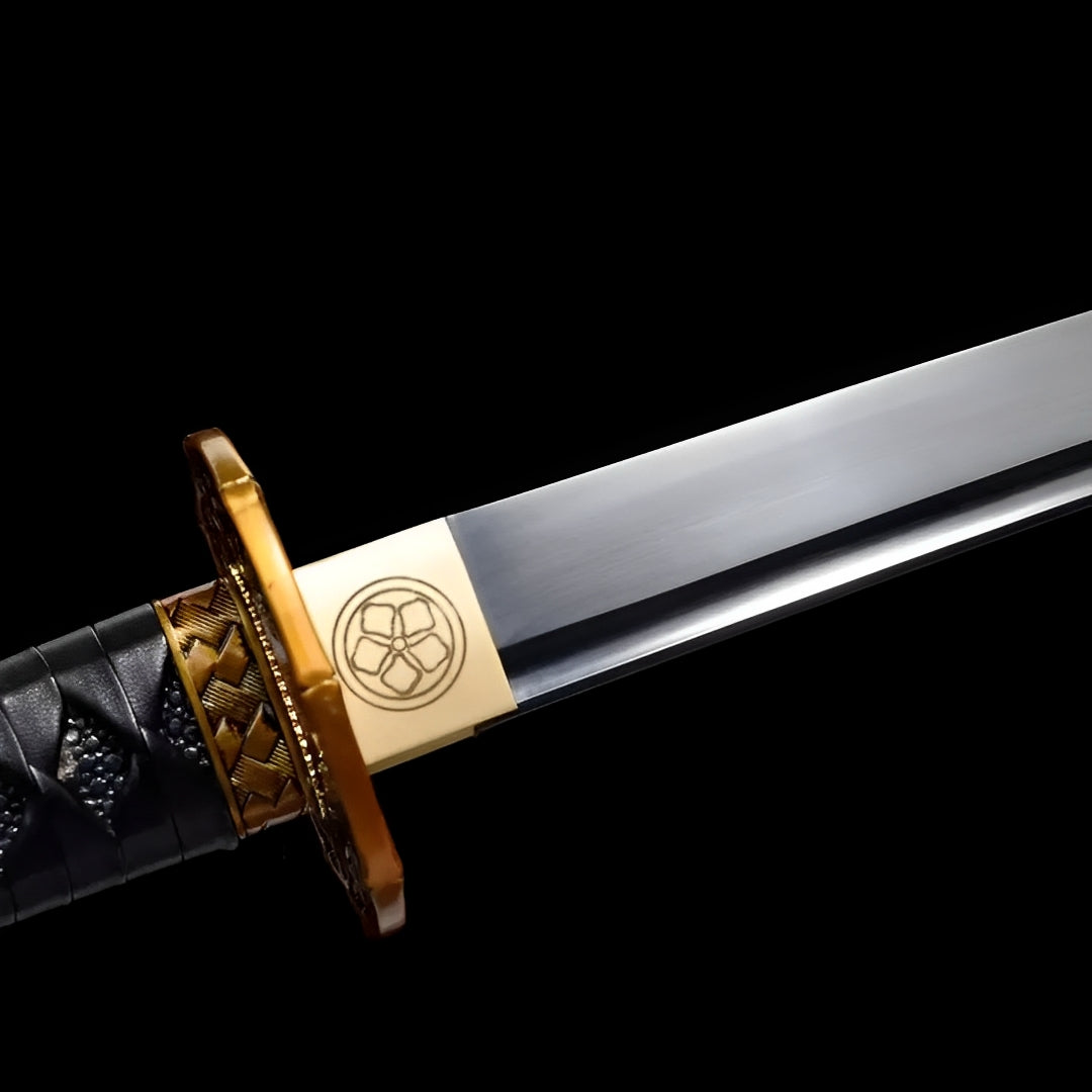 Kurohana wakizashi blade collar with circular floral crest