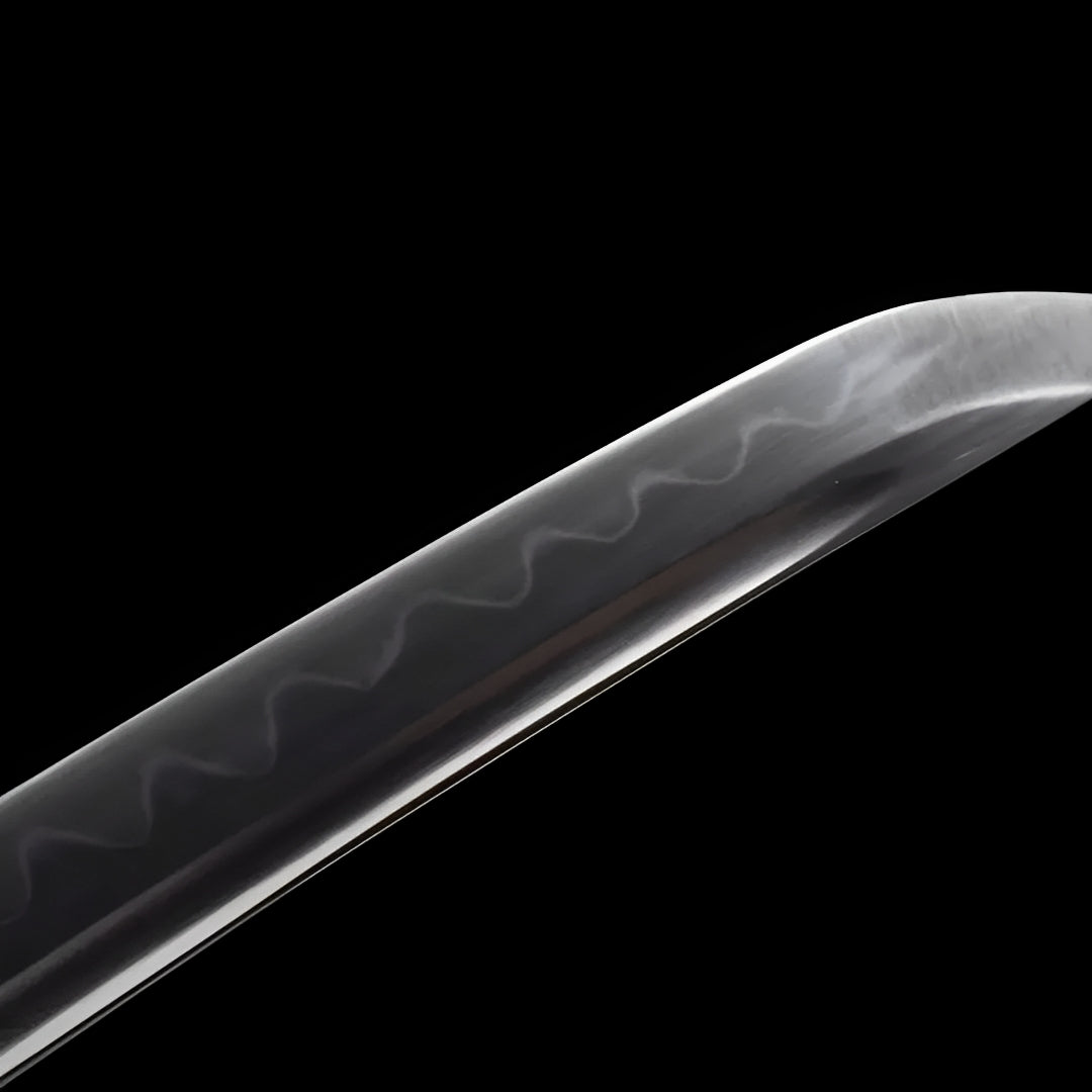 Tsukihana T10 blade tip with a visible hamon